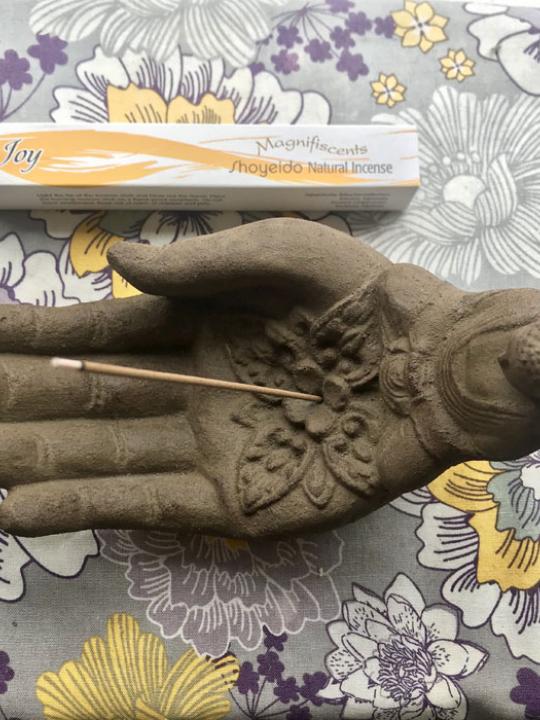 Hand with Buddha Incense Holder
